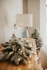 Christmas decorations lights. Modern New Year's decor. Christmas trees with garlands and gifts.