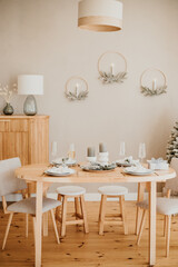 Christmas decorations lights. Modern New Year's decor. Christmas trees with garlands and gifts.
