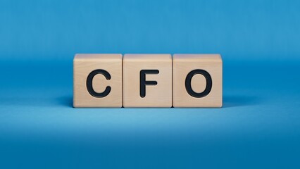 concept word CFO on cubes.close up of wooden elements,Business Concept.3D rendering on blue background.