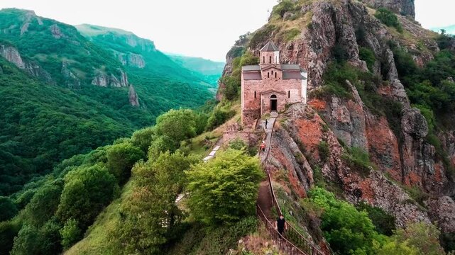 Aerial drone view of Shoaninsky temple Christian cathedral in the mountains Western Caucasus, Karachay-Cherkess Republic. High quality 4k footage