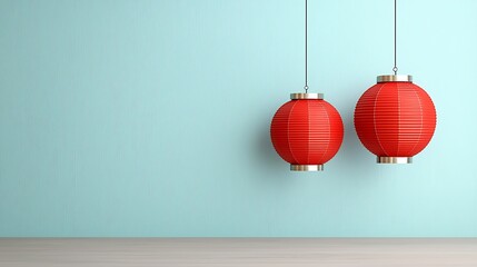 Two red paper lanterns hang against a light blue wall.