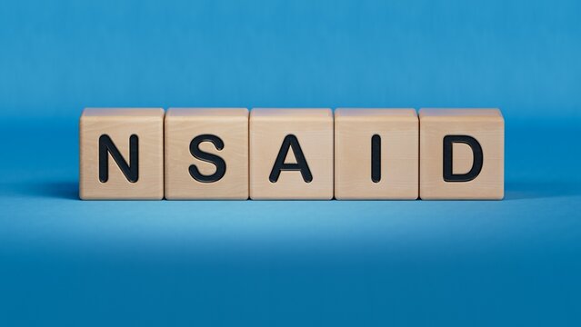 nsaid word made with building blocks.close up of wooden elements,Business Concept.3D rendering on blue background. 