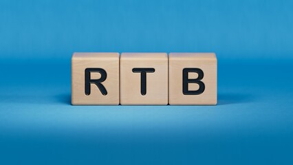 rtb, real, time, bidding. wooden table with cubes. text on wood blocks.close up of wooden elements,Business Concept.3D rendering on blue background. 