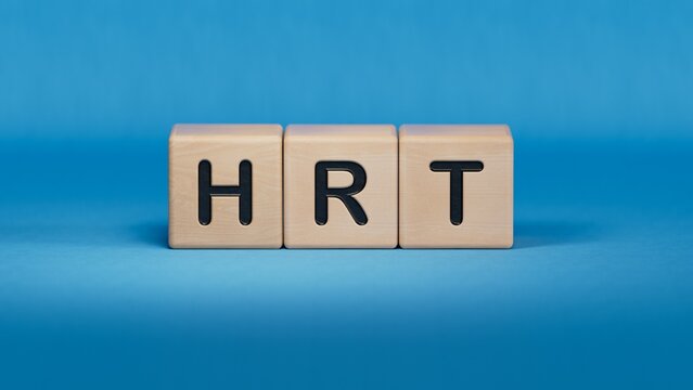 The hrt medical supplies on a notebook on a medical theme. Doctor's workplace.close up of wooden elements,Business Concept.3D rendering on blue background.