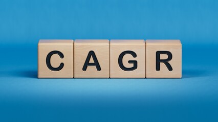 Word risk on wooden cubes with copy space.close up of wooden elements,Business Concept.3D rendering on blue background.