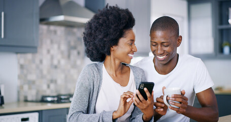 Happy, black couple and phone with coffee for morning, browsing or social media together at home. African, man and woman with smile or mug on mobile smartphone for breakfast, online news or email