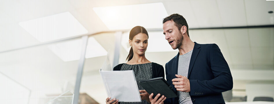 Banner, assistant or business people on tablet in office for planning, project review or report feedback. Documents, below or manager with intern in agency for online news or social network space
