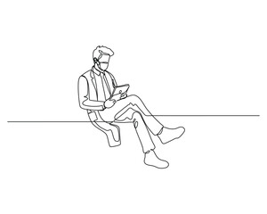 a doctor taking a break, seated cross legged, and using a tablet Captures a moment of relaxation amidst a busy schedule