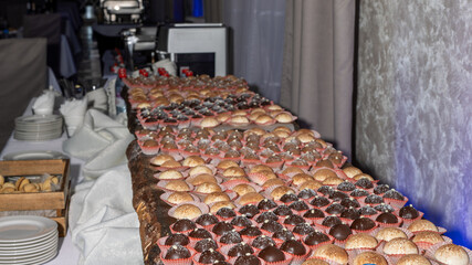 A table full of assorted pastries and desserts