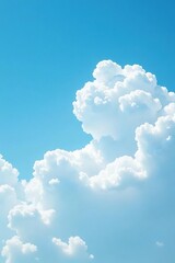 Naklejka premium Soft white clouds float across the clear blue sky, nature, white, wispy