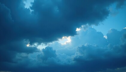 Fototapeta premium Dark blue sky with low altitude nimbostratus clouds, gray, blue