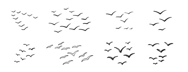 Birds flying line in the sky set. Ink grunge flock of birds afar brush hand drawn. markers and crayons
