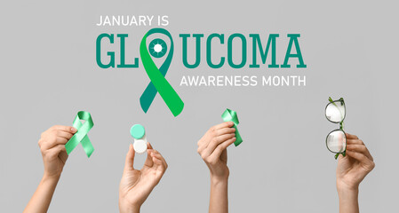 Female hands with container for contact lenses, green ribbons and eyeglasses on grey background. Glaucoma awareness concept