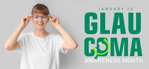 Young woman wearing glasses on grey background. Banner for Glaucoma Awareness Month
