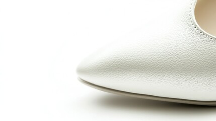 Close-up of a high heelâ€™s texture and detailing on a pure white background.