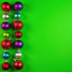 Colorful Christmas ball decorations on a green background, balls, holiday
