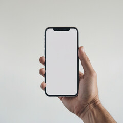 A image of a hand holding a modern smartphone with a blank white screen.