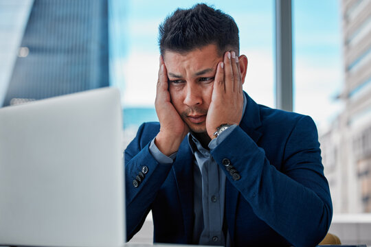 Businessman, frustrated and distress in office, laptop crisis and 404 error, tech fail and difficult project. Worried, accountant and mistake by desk with bad internet, software glitch and anxiety