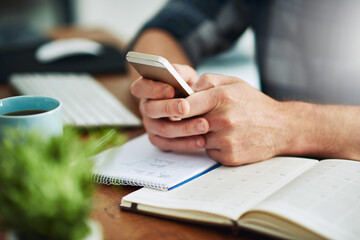 Hands, phone and businessperson in office with notebooks for research with creative project....