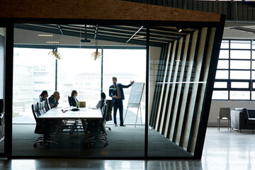 Meeting, presentation and business people in boardroom, planning and feedback for project. Sales...