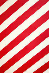 Obraz premium Abstract red and white diagonal stripes create a bold and dynamic pattern, reminiscent of modern art or signage, conveying movement and energy.