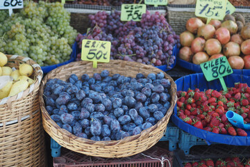 A Colorful Variety of Fresh Fruits Delightfully Displayed at Market Stall