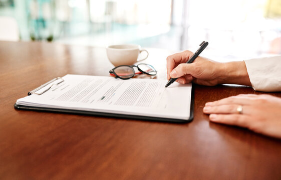 Office, hands and person with document for signature, business agreement and corporate policy on desk. Table, employee and accountant with contract for compliance, application and approval for deal
