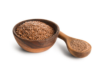 Bowl of flax seeds and wooden spoon with flour on white background