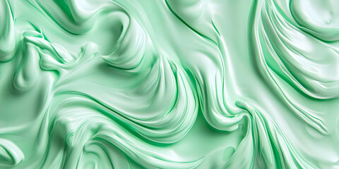 Obraz premium A smooth, mint-colored abstract texture resembling cream or paint.