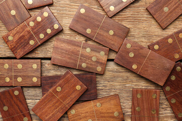 Dominos blocks on wooden background