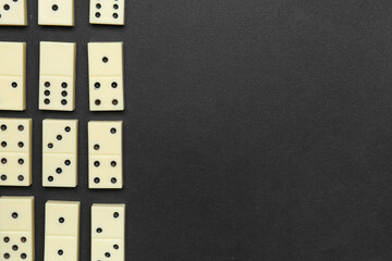 White dominos blocks on black background