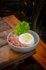 rice with vegetables, egg fries, chicken fries sambal matah