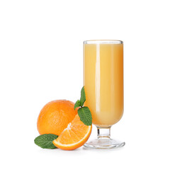 Glass of tasty juice with oranges and mint leaves on white background