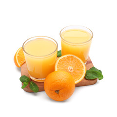 Wooden board with glasses of tasty juice, oranges and mint leaves on white background