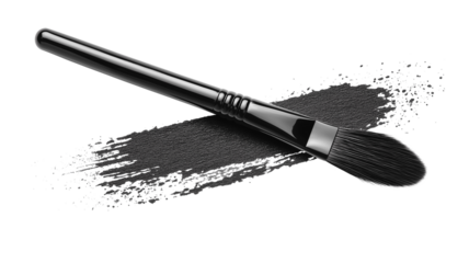 A black brush is laying on a black line