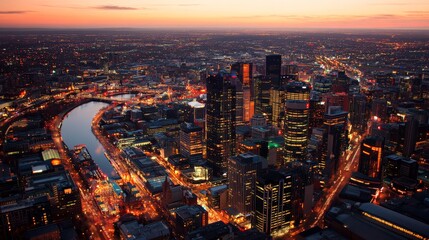 Fototapeta premium Aerial Night View of Vibrant Cityscape with Lights