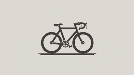 Obraz premium A simple, black and white silhouette of a bicycle on a gray background.