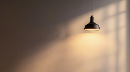 Minimalistic pendant lamp casting warm light on textured wall