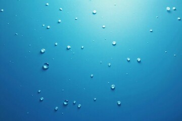 Macro View of Sparkling Water Droplets on a Cool Blue Backgroun
