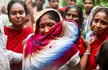 Friends and family are in an emotional atmosphere of bridal farewell, an integrated part of bengali...