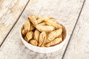Shelled dry almond nut heap
