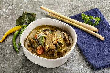 Thai green curry soup with basil