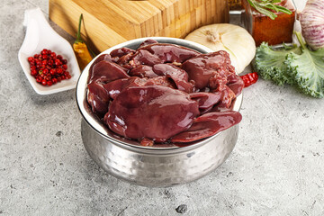 Raw uncooked chicken liver in the bowl