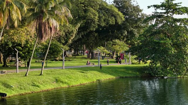 aerial view of kuala lumpur in the background with beautiful morning lark park scenery people jog