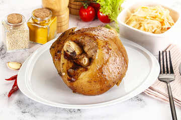Baked pork knee with spices