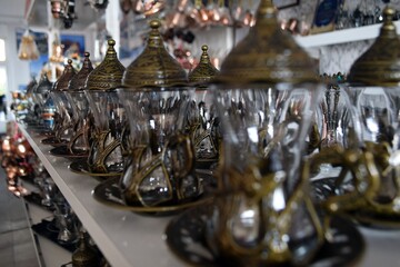 Small Turkish glasses in iron cup holders.