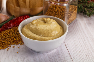Dijon mustard sauce in the bowl