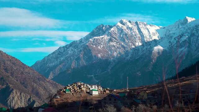 Triloknath village under the snowy Himalayan mountain peak at Lahaul and Spiti district in Himachal Pradesh, India. Beautiful village under the snowy Himalayan mountain peaks during the winter season.