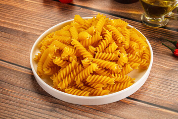 Italian dry pasta Fussili for bowl