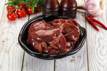 Raw chicken liver uncooked in the bowl